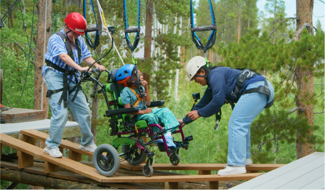 Ruby and her dad skiing